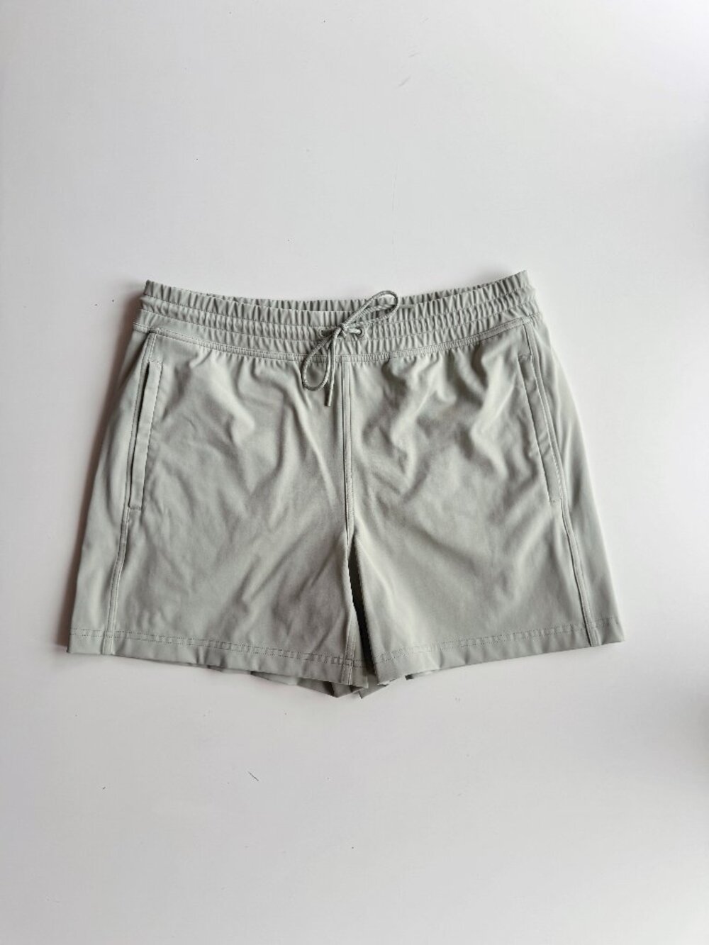 Aritzia TNA Slick Warm-Up Silver Sage Green High Rise Athletic Shorts, Size L